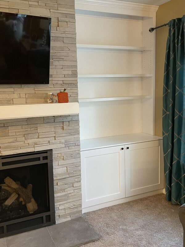 Fireplace built-in cabinet right