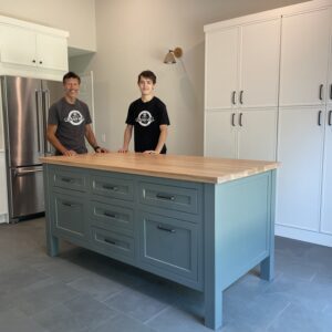 Tim and Seth with kitchen island